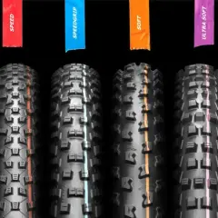 Cztery opony rowerowe z różnymi bieżnikami: SPEED, SPEEDGRIP, SOFT, ULTRA SOFT. Pomaga to zrozumieć, jak czytać rozmiar opon.